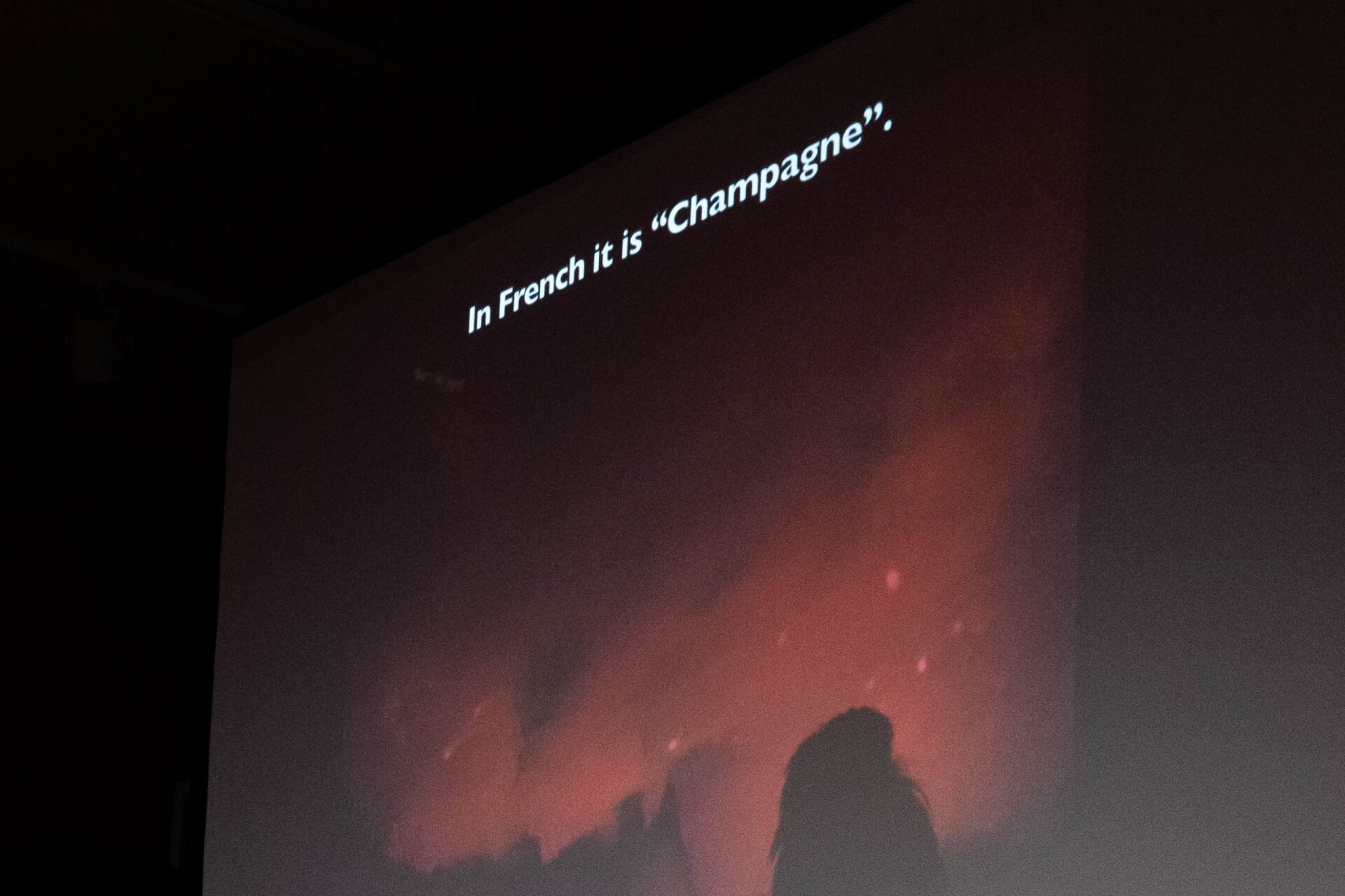 Marianne Chargois perfoming Golden Flux. Text reads 'In French is is Champagne'.